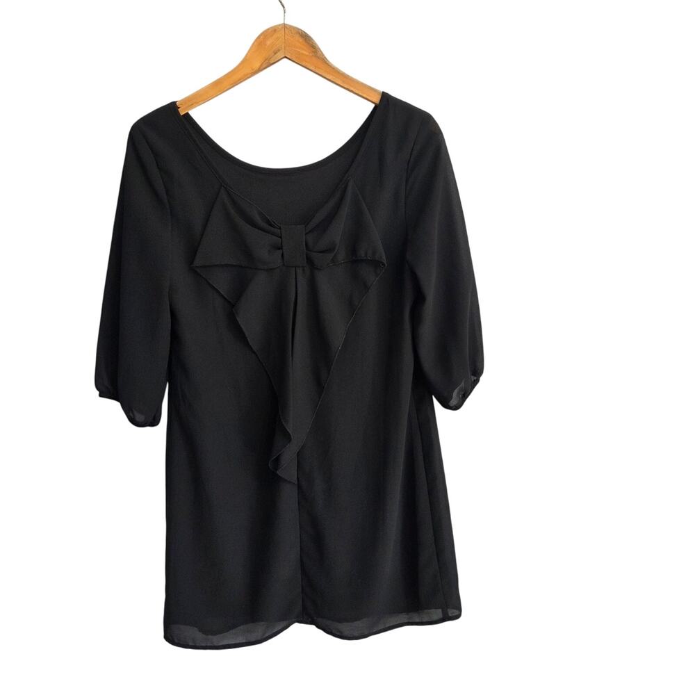 A. Byer Woman's Black Short Sleeve above knee dress with Bow in Back size M